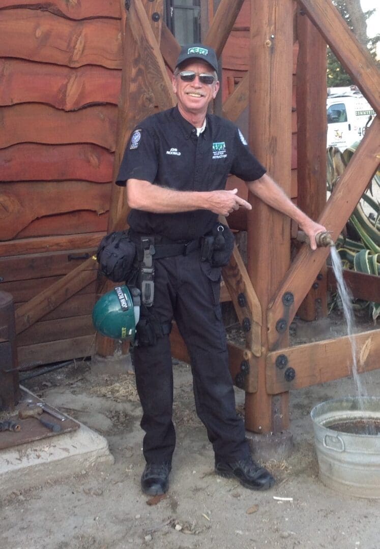 A police officer is standing in front of a fire hydrant.
